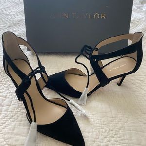 Black suede pumps